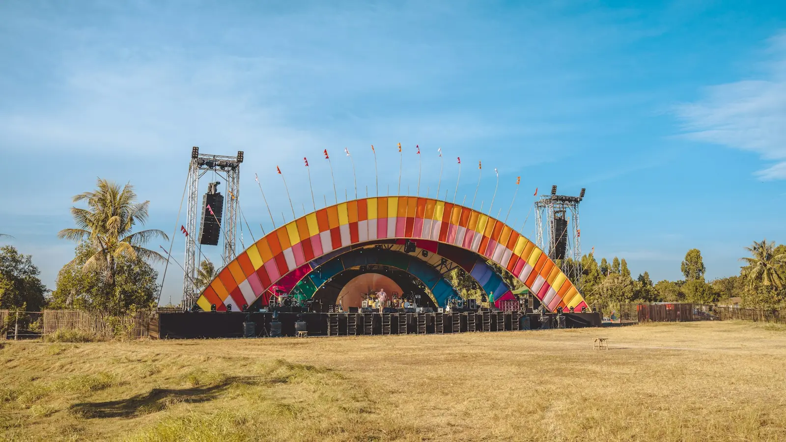 a stage set up for a concert in a field