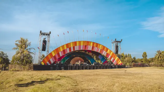 a stage set up for a concert in a field