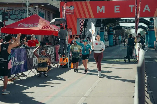 Runners crossing the finish line at a race